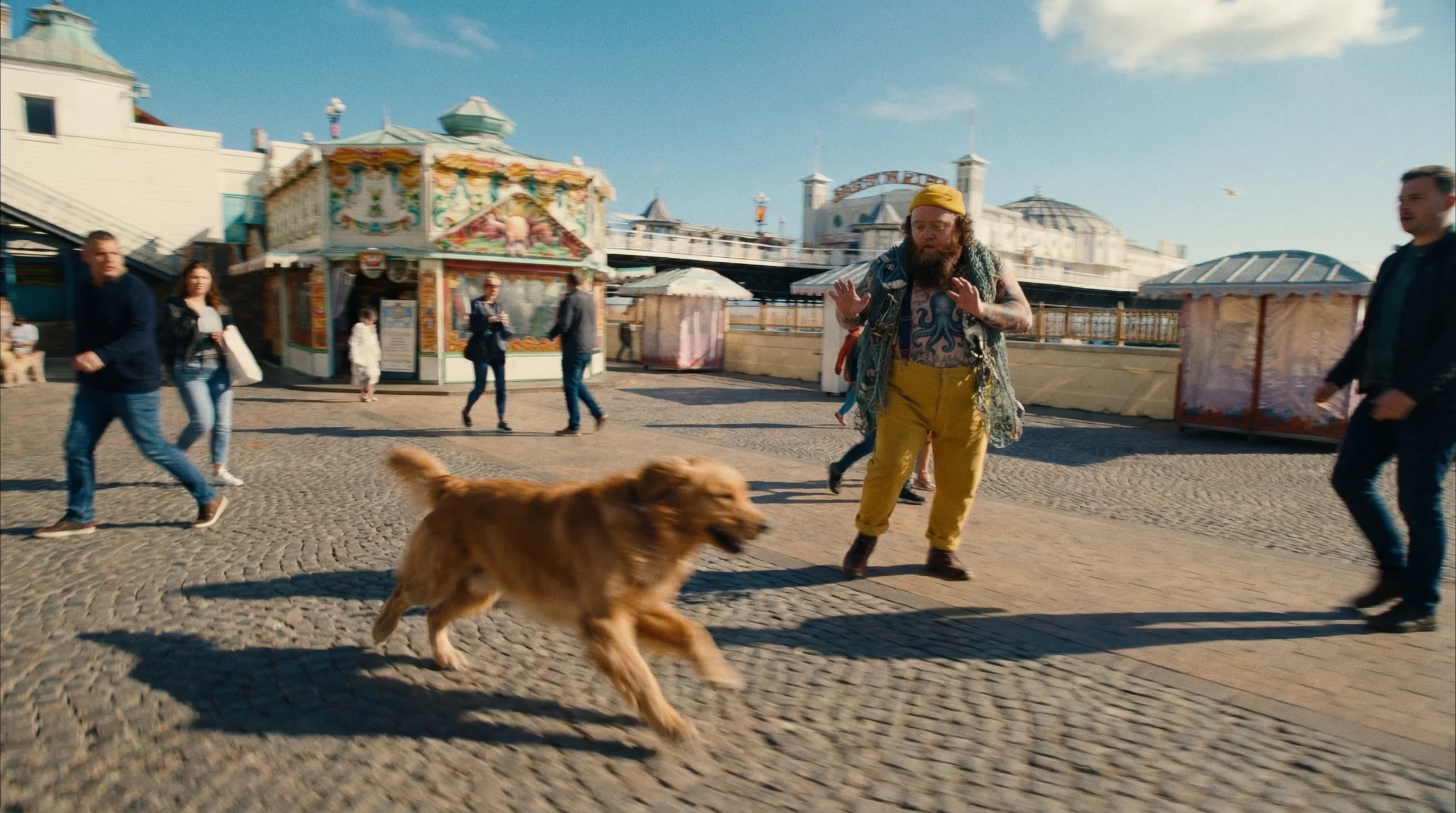 Dog starting the chase near Brighton Pier